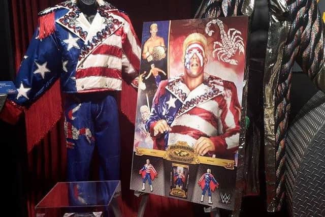 Merchandise for WWE all-time great wrestler Sting on display at the pre-WrestleMania Axxess event.