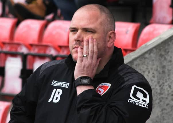 Jim Bentley looks on against Barnet on Saturday.