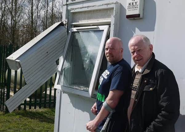 HEARTLESS HAUL: Chairman of Leyland Warriors, Phil Roberts with Secretary Peter Kearns assess the damage