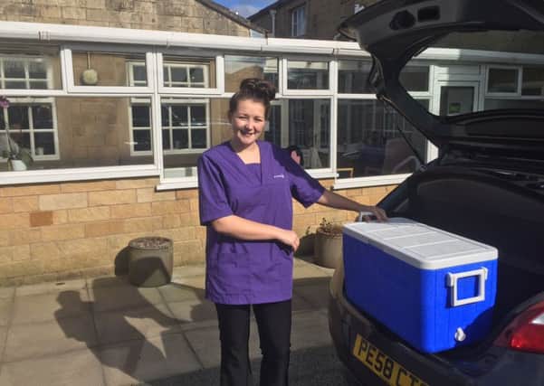 Alicia Grimshaw, one of the team at lston Lodge cafre home in Longridge , setting out to deliver lunches.