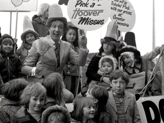 Ken Dodd entertains the children on a visit to Preston in April 1976