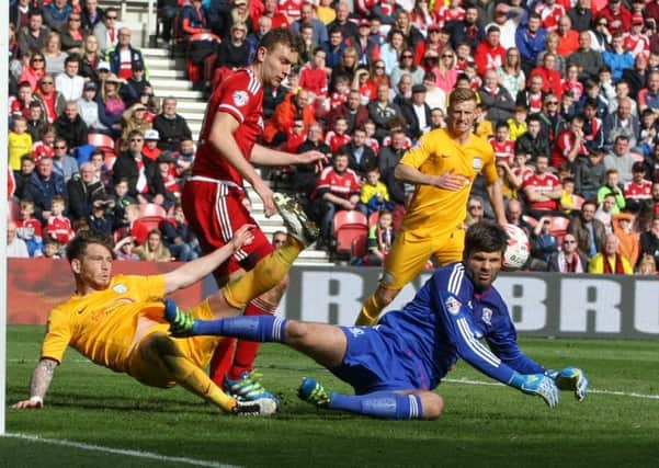 PNE striker Joe Garner in the thick of the action at Middlesbrough
