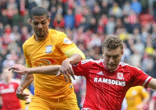 Jermaine Beckford moves to tackle Middlesbroughs Ben Gibson
