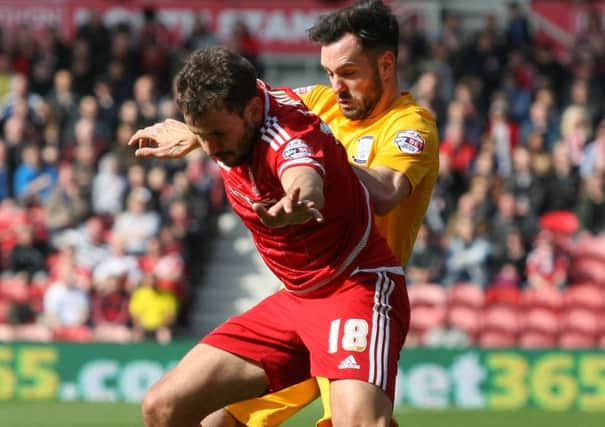 Christhian Stuani and Greg Cunningham battle for possession in Saturday's clash at the Riverside Stadium