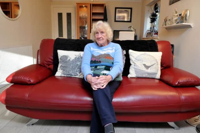 Widow Joyce Powell at her bungalow in Chorley