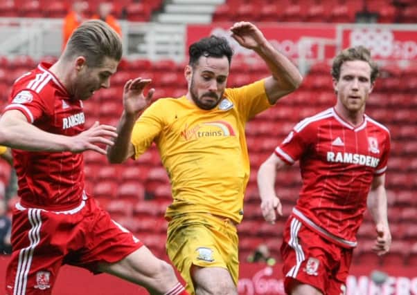 Greg Cunningham (centre) in action at Boro