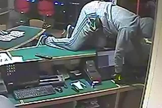 CCTV of a knife-point robbery at Betfred in Granton Walk, Ingol on April 17