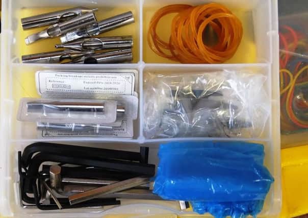 Equipment seized from Stephen Vickers, 35, of Dorman Road, Preston who has been ordered to pay a total of £1,640 after he was found guilty of operating as an illegal tattooist from his home.