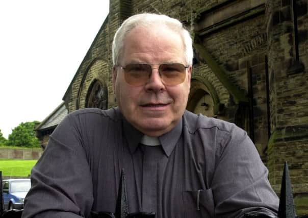 DUSTING: Genial priest Fr John Cribben was cleaning the arches of his church when he plunged to his death