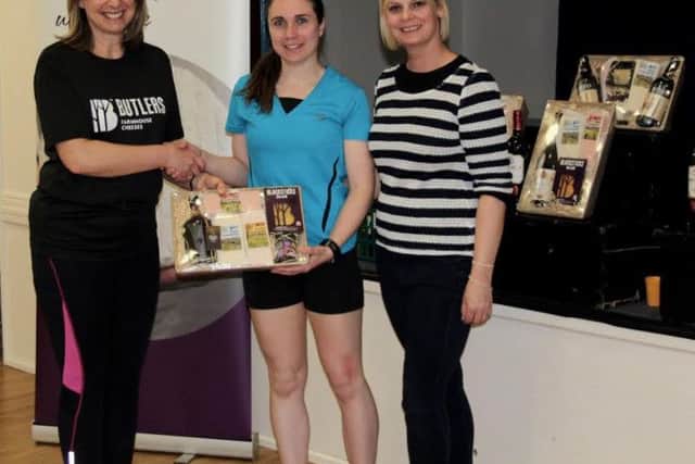 Blacsticks bule 10k -  1st female Maria Snell. being presented by  Gill Hall from Butlers Farmhouse Cheeses, and on the right our new headteacher at Whitechapel Mrs Noblett.