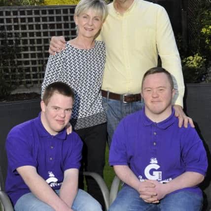 Christina and John Stringfellow with their sons Luke, 28 and Jacob, 20