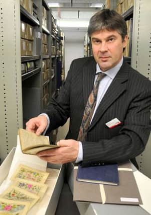 Neil Sayer the Archive Access Manager at Lancashire Archives with the Atkin family papers, including a diary from Galipoli