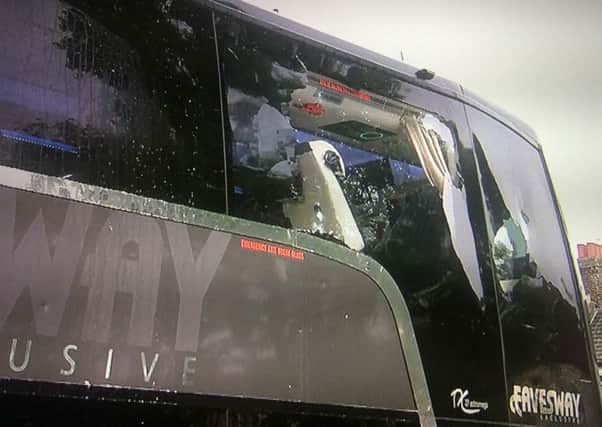 Damage to the Eavesway coach at the West Ham v Manchester United game. Photo taken from Sky Sports