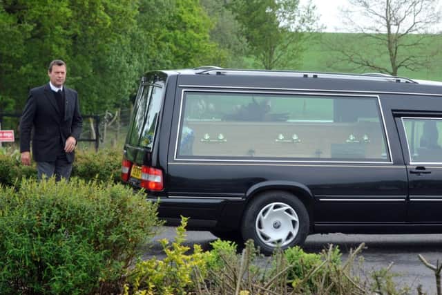 Friends and family attend the funeral of Yianni Hadjigeorgiou, who died aged 25 while studying in Sheffield.
