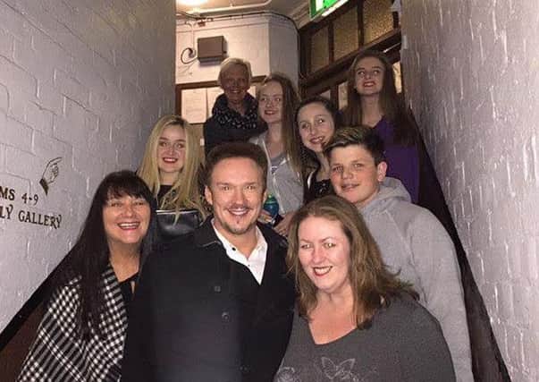 Preston Musical Comedy Show Choir preparing for their tour date with operatic and pop singer Russell Watson (centre)