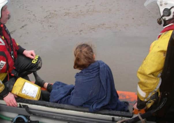 Teams rescued a teenage girl trapped in mud in the Keer channel near Warton stock car track.