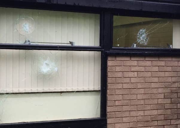 Acorn's Primary School's windows were smashed by local youths.