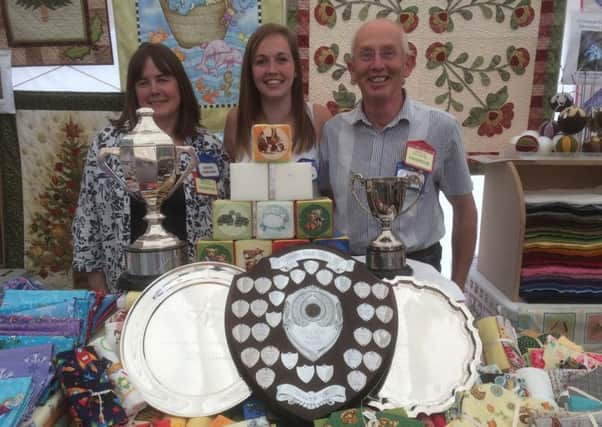 Mum-sister duo Carole and Emma Galbraith, from Barton and own Quilter's Quarters in Longridge saw their Starburst and Prism of Light designs awarded first and third place respectively at the Qiults UK competition in Malvern at the Three Counties Show Ground.