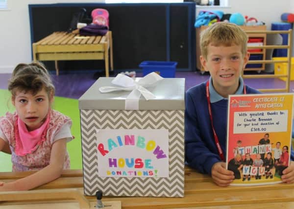 Millie Proudfoot and Charlie Brennan, who donated birthday money to Rainbow House