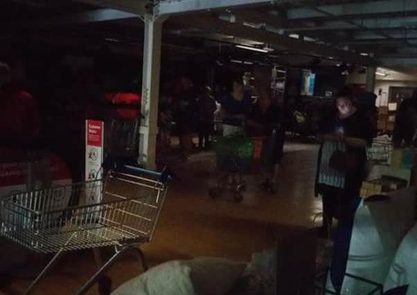 Shoppers in the dark in Tesco, Chorley