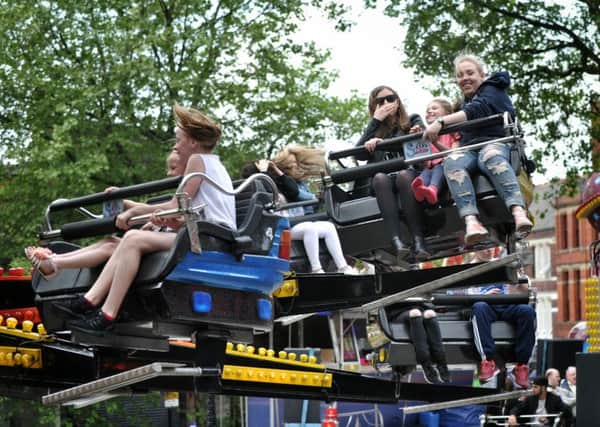 People enjoy the fair  Preston Annual Whitsuntide Fair