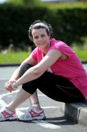 Sian Smith from Ribbleton in Preston, who was diagnosed with an aggressive form of breast cancer last year, and took part in last year's race for life while undergoing treatment. She will be running this year's event in June