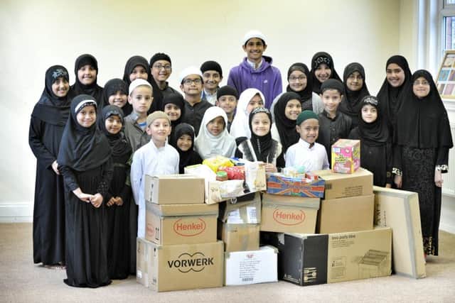 Picture by Julian Brown 13/05/16


Some of the children at the Broadgate Madrasa, Preston, who have collected food for a food bank.