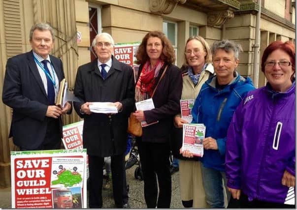 Petition: Guild Wheel co-creator Peter Ward (second left) presents petition to councillors