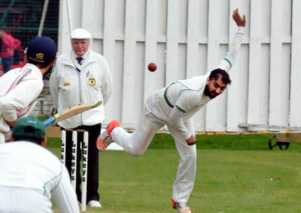 Preston bowler Afzal Kapadia in action in the defeat by Blackpool
