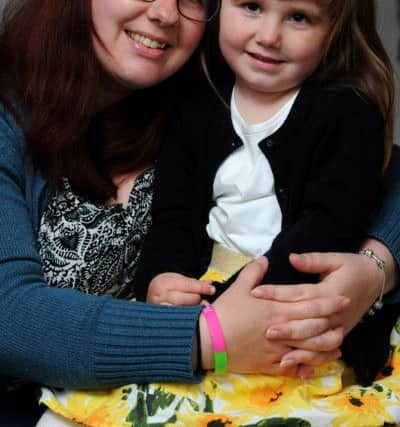Bella Morris aged 3 from Chorley is suffering from a rare life-limiting illness called Vanishing White Matter. The family are campaigning to raise money to fund a doctor who is researching treatments for the illness. Seen with mum Natalie Stevenson. Picture by Paul Heyes, Thursday May 26, 2016.