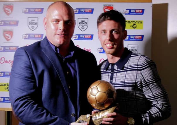 Jim Bentley presents Jamie Devitt with the Players' Player of the Year award.