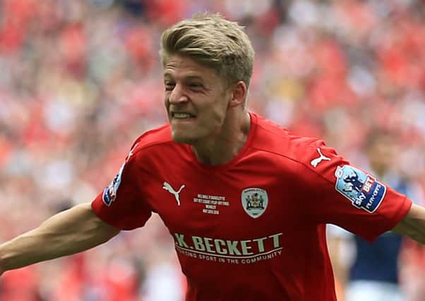 Lloyd Isgrove scoring for Barnsley at Wembley in the League One play-off final