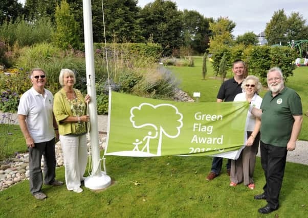 Kepple Lane Park Trustee's with their Green Flag which was risen for the Fun Day in Garstang from left, Coun Gordon Harter, trustee and consort, Coun Lynn Harter, Mayor of Garstang, Andy Brown, Joan Baptie and Coun Joe Gilmour