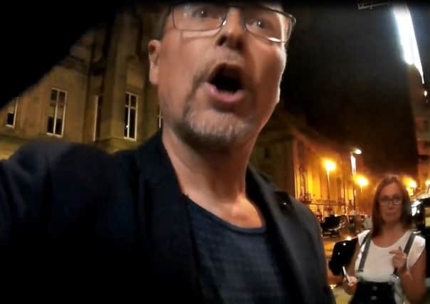 VERY UNWISE: Coun Caleb Tomlinson confronts the doormen in stills taken from the film footage