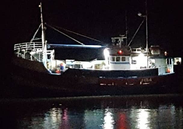 Police arrested the 60-ton fishing boat's skipper after it ran aground close to Fleetwood docks in the early hours of the morning