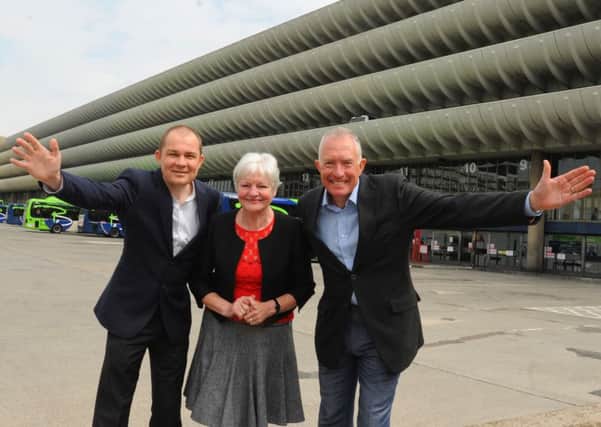 What next?: County Council leader Jenny Mein (centre) with architect John Puttick and consultant Jerry Glover recently unveiled new plans for Preston Bus Station. But now a row over new charges has caused controversy.