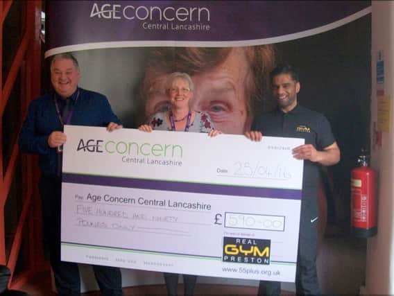Roger Jones and Linda Chivers, of Age Concern, with Mo Seedat, assistant manager of Real Gym