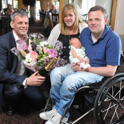 Photo Neil Cross
Andrew and Libby Hartley at The Keys restaurant with baby Isabella Kay, after Libby went into labour during a meal lthere ast week, with General Manager Cameron Watson