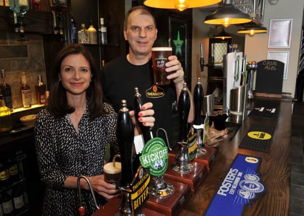 MP Seema Kennedy pulls the first pint of the Kick Off beer at the opening of the refurbished Pear Tree pub in Penwortham