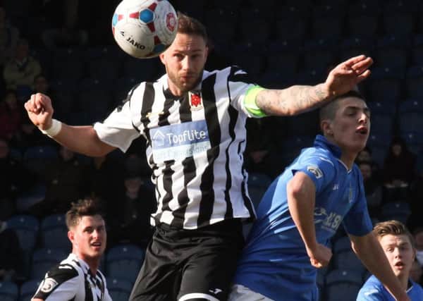 Stockport County v Chorley - Conference North, Saturday, March 21, 2015
Skipper Andy Teague battles for the ball in the air