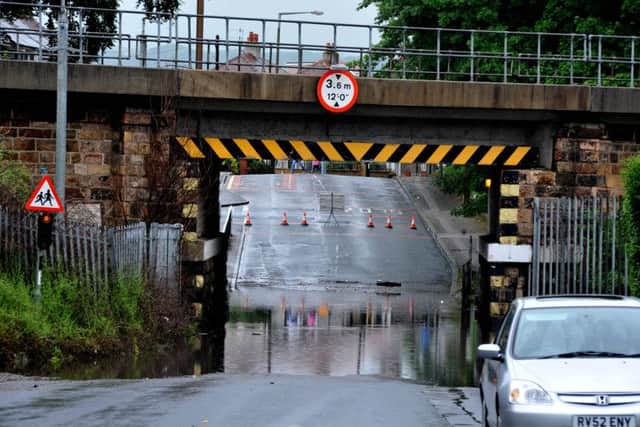 Flash flooding under  the railway bridge at Torrisholme Road, Lancaster