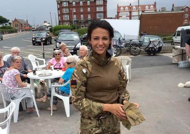 Michelle Keegan takes a break while filming in Fleetwood for drama series Our Girl.