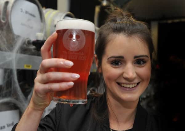 LEP - NEWS and BIG NIGHT OUT
Rachel Osborne serves a perfect pint at the 13th annual beer festival and Pumpking at The Continental, Preston.