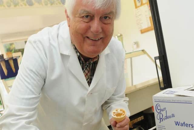 Ken Clegg scooping ice cream at Dairy Shop, Leyland