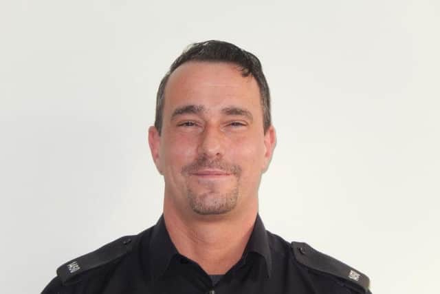 PC Lee Brown who helped rescue a woman from the River Darwen in Walton-le-Dale.