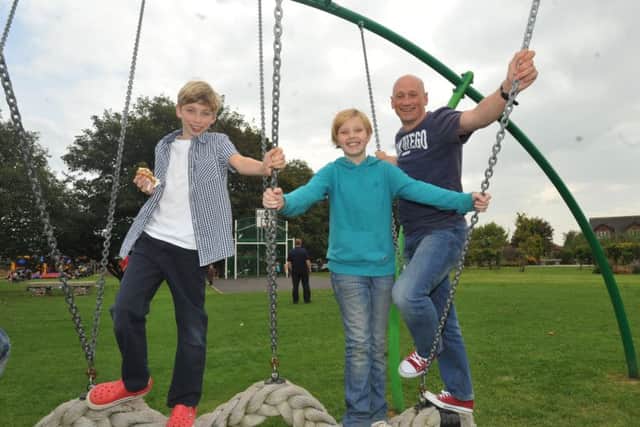 GARSTANG COURIER and LEP
from left, Thomas Smith,11, Erin Byrne, 11, and Adrian Smith enjoy the new park at the Kepple Lane Park fun day to officially open the new facilities at the park, off Kepple Lane, Garstang.
