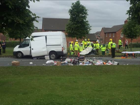 Pictures of the scene at Central Avenue in Buckshaw Village after a crash between a car and a van. Pictures by Lancashir Road Police.