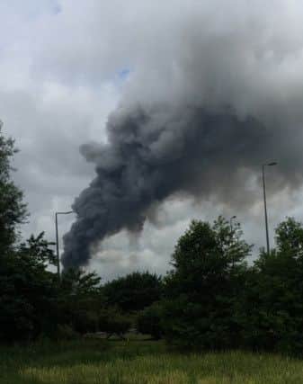 Smoke plume coming from a fire at Whitfire Shavings in Church Lane, Farington Moss. Picture: @sameLove