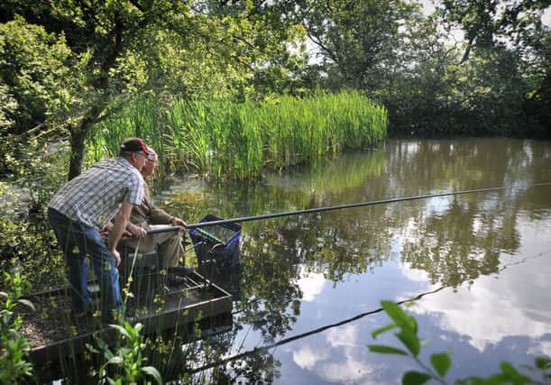 Better times: Withnell Angling Club are currently unable to use Farington Lodge due to contamination