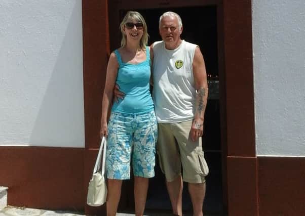 David and Diana Townend, from Chorley, on holiday in Greece, where the couple say David may have contracted Legionnaires' disease. They are taking legal action against Thomas Cook.